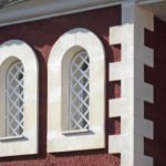 Fachada de una vivienda con dos ventanas