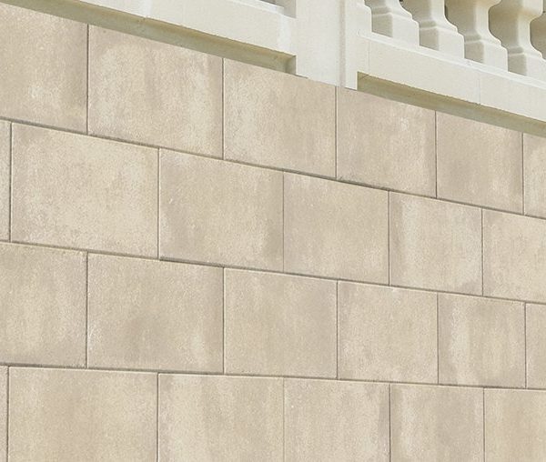 Pavimentos y aplacado Tessera con muro en el fondo